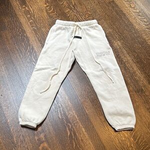 Essentials Cream Sweatpants with Tapered Legs and Elastic Cuffs